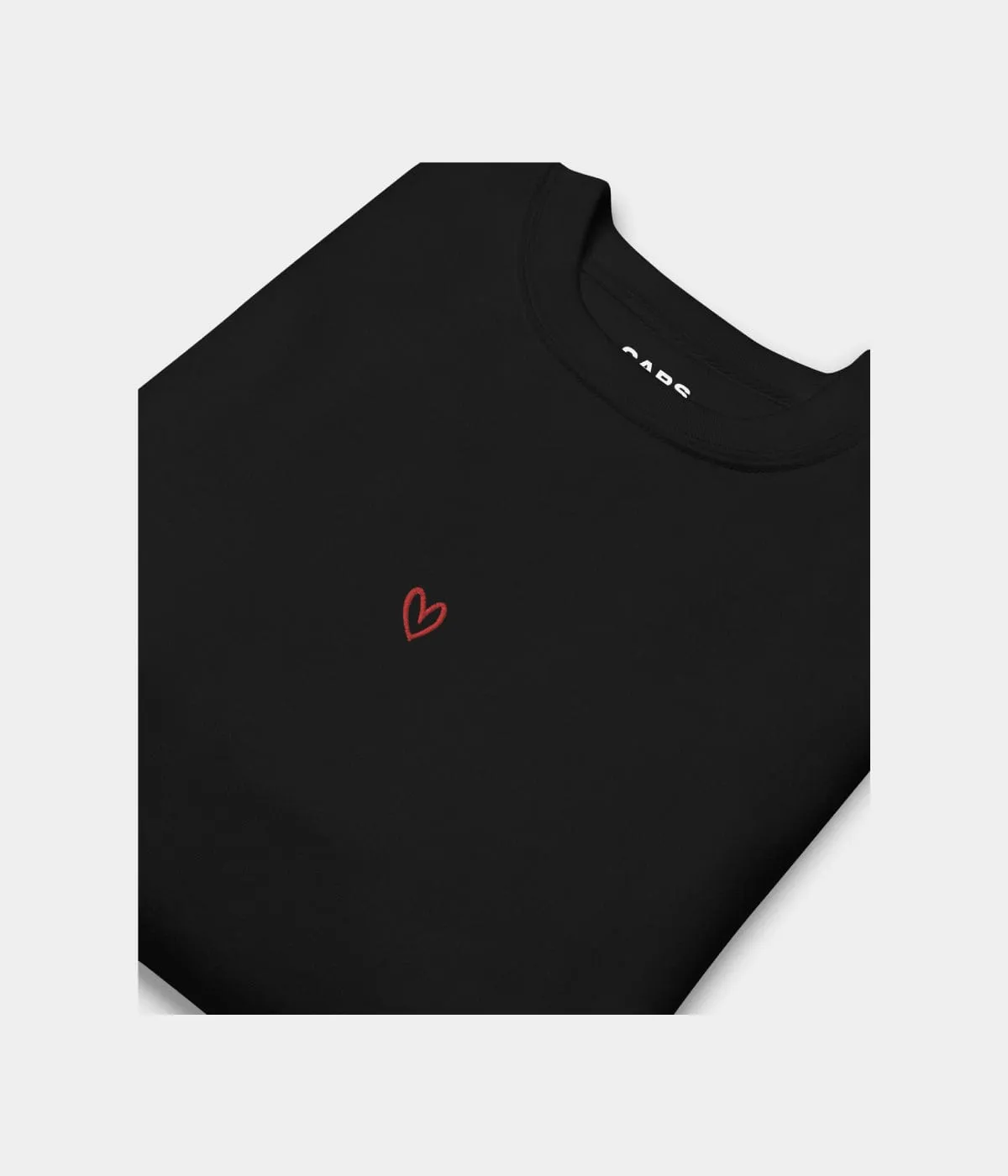 DRAWN HEART SWEATER.